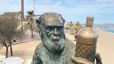 A bronze statue of a monkey